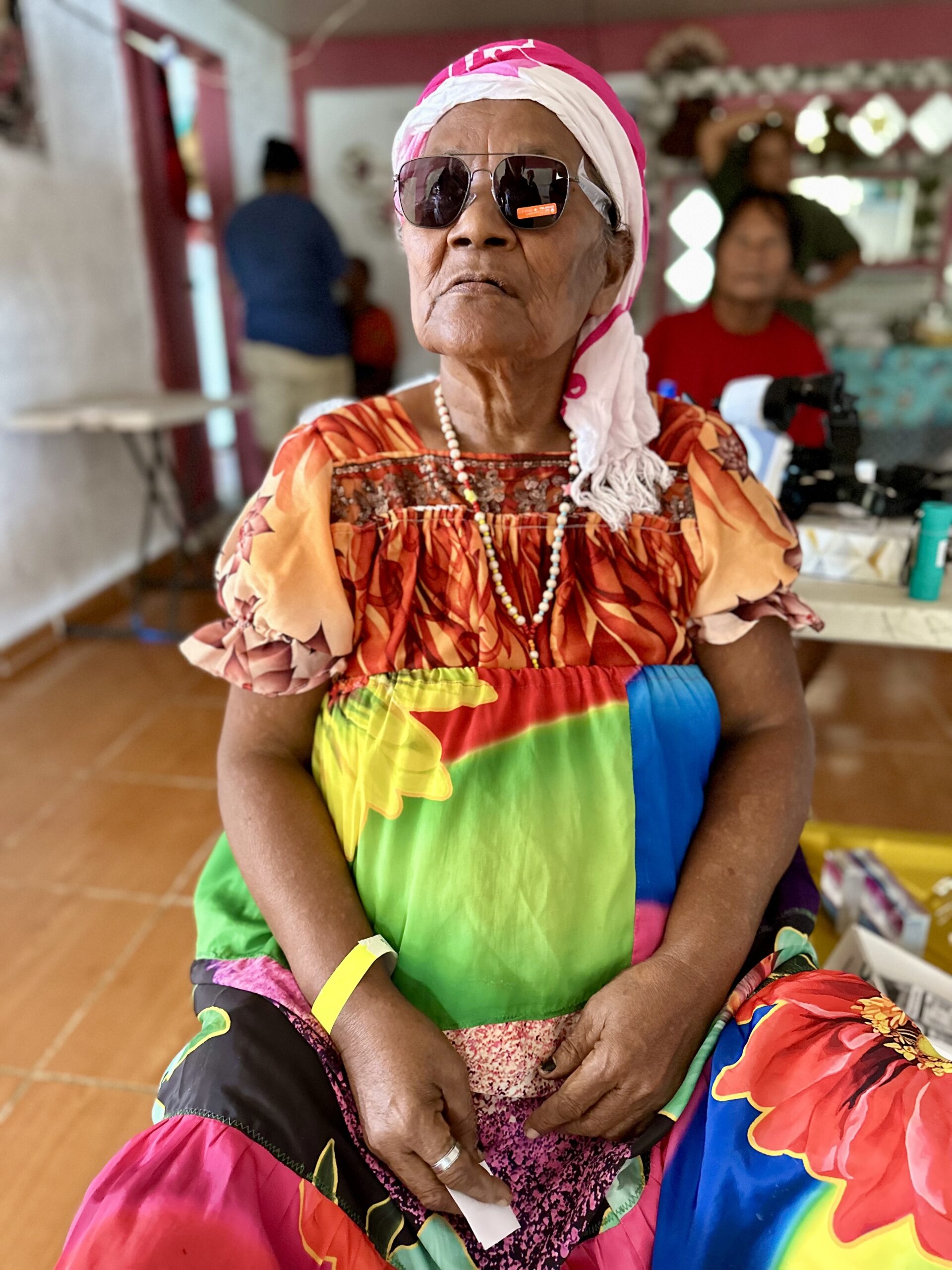 woman sitting with sunglasses